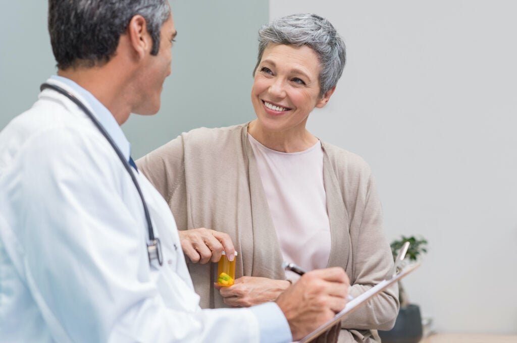 woman talking to healthcare provider